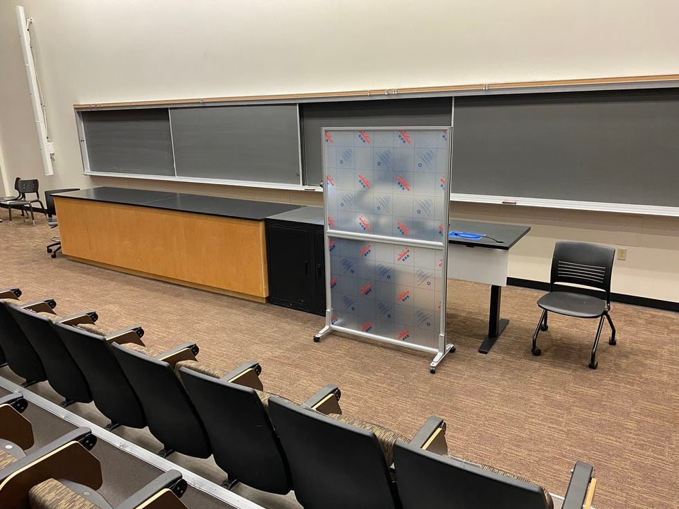 UK bought 375 portable plexiglass partitions in classrooms distancing the professor from the students.