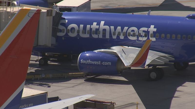 FILE PHOTO - A Southwest Airlines flight attendant suffered a compression fracture in her back...