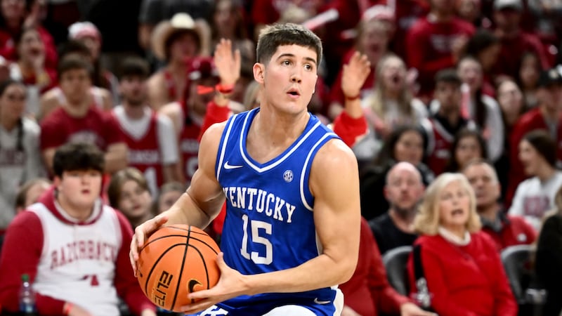 Kentucky guard Reed Sheppard (15) runs a play against Arkansas during an NCAA college...