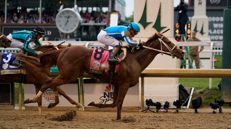 Mage (8), with Javier Castellano aboard, across the finish line to win the 149th running of...