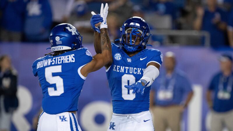 Kentucky wide receiver Anthony Brown-Stephens (5) and running back Demie Sumo-Karngbaye (0)...