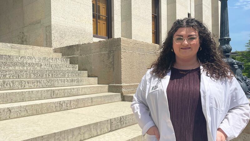 Alexandra Fountaine, a medical student at Ohio University, poses for a picture in front of the...