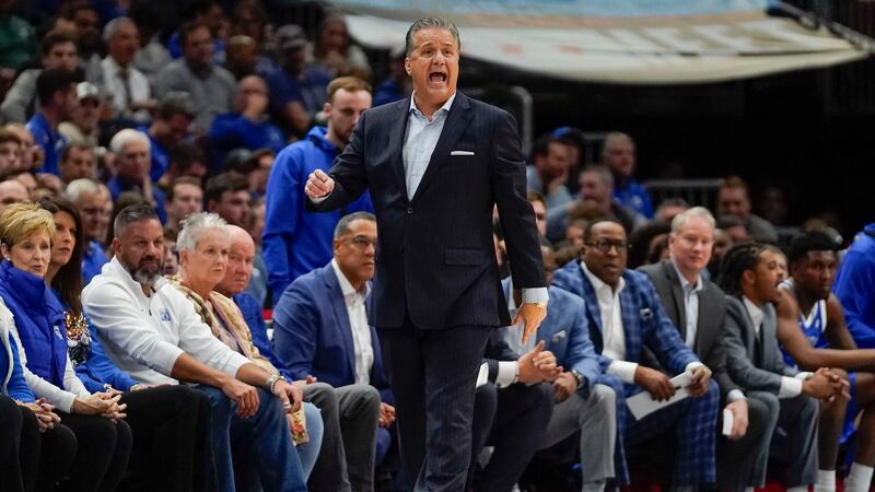 Kentucky head coach John Calipari shouts from the sidelines during the first half of an NCAA...