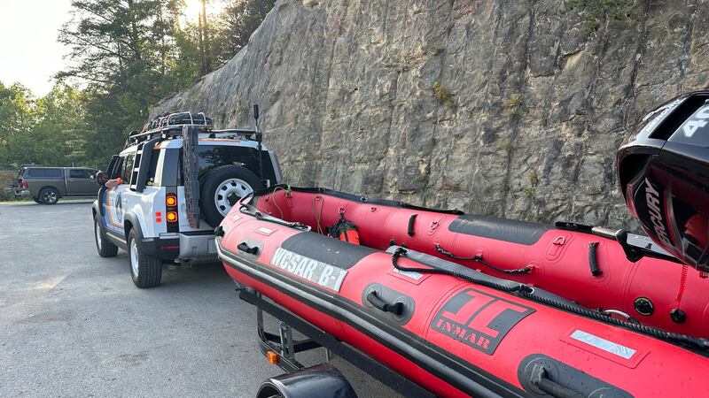 An unidentified man has died after trying to swim across Wolfe Lake.